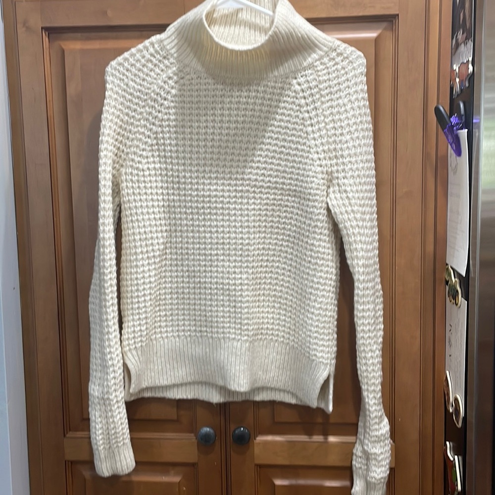 White women’s sweater